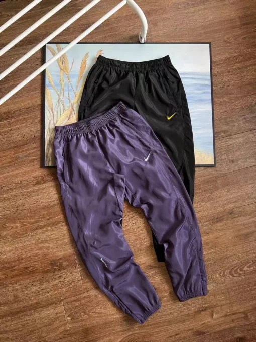 Luxuriöse Nike Cropped Pants Blaue Nylon-Atmungskollektion