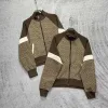 Hochwertiger Coach-Mantel in Khaki mit Logo-Kollektion