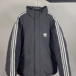 Hochwertige Balenciaga Daunenjacke aus schwarzer Baumwolle im Streifenstil