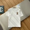 Hochwertige Burberry Kurzarm-Kollektion aus schwarzer Baumwolle mit Karomuster