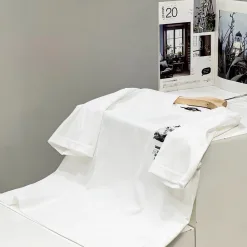 Hochwertige Fila Kurzarm-Kollektion aus schwarzer Baumwolle mit Print