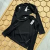 Hochwertiges Descente Langarmshirt aus schwarzem Nylon, klassisch und luxuriös