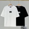 Luxuriöses Fila Kurzarmshirt im schwarzen Baumwolldruckstil
