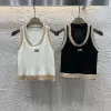 Luxuriöse Dior Weste im Goldstrick-Stil mit Stickerei