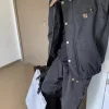 Hochwertige Carhartt Mäntel aus schwarzem Leder im Used-Look