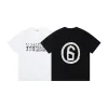 Luxus Margiela Kurzarm Schwarz Baumwolle Print Stil