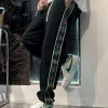 Luxuriöse Gucci Jogginghose in schwarzem Strick mit Stickerei