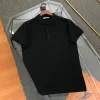 Hochwertiges Prada Poloshirt aus schwarzer Baumwolle mit Stickerei