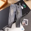 Hochwertige Dior Jeans Kollektion mit grauem Denim-Print