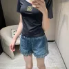 Hochwertige Dior Shorts in blauem Leder im Monogramm-Stil
