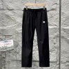 Premium Descente Hose im grünen Logo-Stil