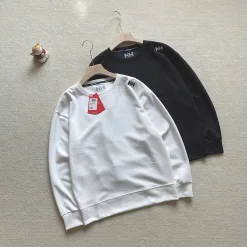 Hochwertige, langärmelige, atmungsaktive Kollektion aus schwarzer Baumwolle von Helly Hansen