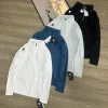 Premium Descente Langarmshirt aus schwarzem Nylon im klassischen Stil