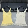 Hochwertige Hosenträger aus der Miu Miu Yellow Knit Kollektion