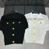 Luxus-Kollektion mit kurzärmeligem Goldstrick und Monogramm von Balmain