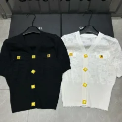 Luxus-Kollektion mit kurzärmeligem Goldstrick und Monogramm von Balmain