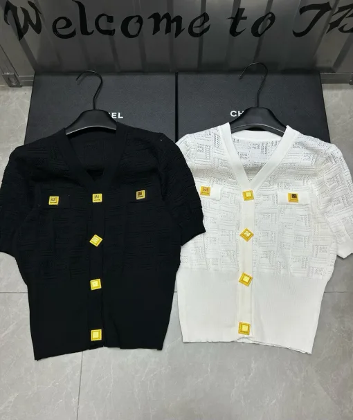 Luxus-Kollektion mit kurzärmeligem Goldstrick und Monogramm von Balmain