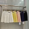 Hochwertiger Thom Browne Faltenrock aus weißer Strickstickerei-Kollektion