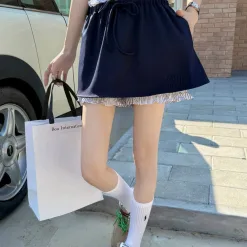 Hochwertiger Miu Miu Kurzrock Grau Logo Kollektion