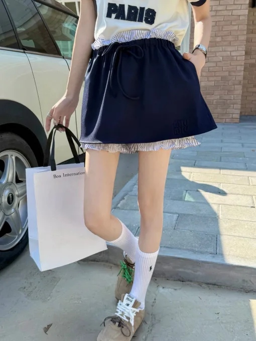 Hochwertiger Miu Miu Kurzrock Grau Logo Kollektion