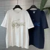 Premium Lacoste Kurzarmhemd im weißen Stickstil