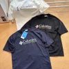 Hochwertiges Columbia Kurzarmshirt aus schwarzer Seide im Logo-Stil