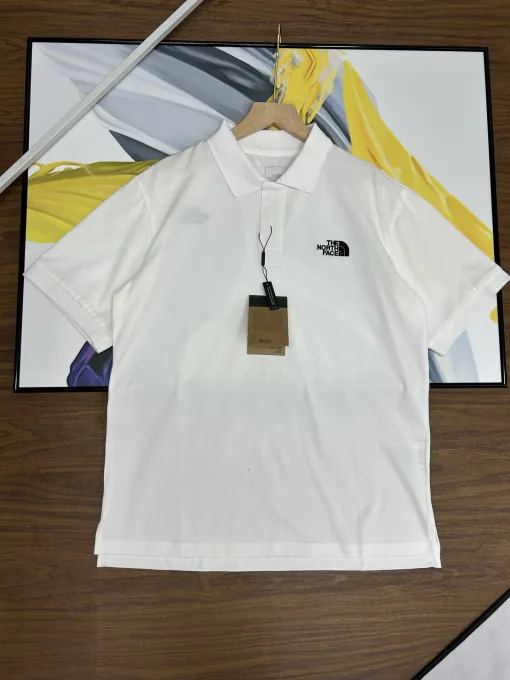 Premium The North Face Kurzarm-T-Shirts Schwarz Baumwolle Bestickter Stil