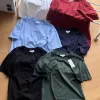 Bestseller Lacoste Kurzarmhemd aus schwarzer Baumwolle im Logo-Stil