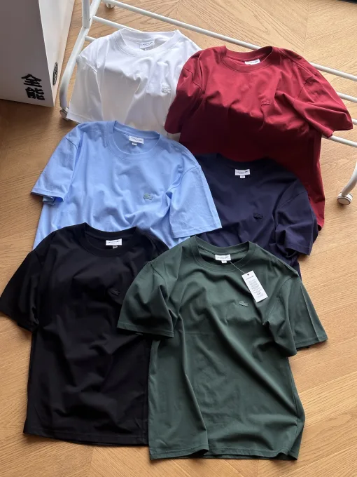 Bestseller Lacoste Kurzarmhemd aus schwarzer Baumwolle im Logo-Stil
