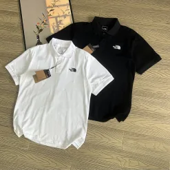 Bestseller The North Face Kurzarm-T-Shirts Schwarz Baumwolle Bestickt Luxus