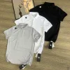 Luxuriöse, kurzärmelige, atmungsaktive Kollektion aus schwarzem Polyester von Descente