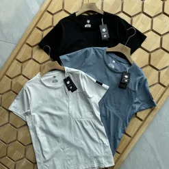 Hochwertiges Descente Kurzarm-Shirt aus schwarzer Baumwolle, Urban Luxury