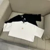 Hochwertiges Lululemon Kurzarmhemd aus schwarzer Baumwolle im Logo-Stil