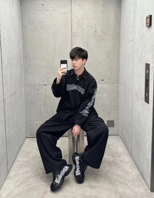 Hochwertiger Balenciaga-Stil mit langen Ärmeln und gelbem Print