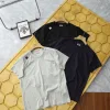 Hochwertige Descente Kurzarm-Strickjacke in Schwarz, Freizeitkollektion