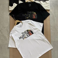 Hochwertige The North Face Kurzarm-Kollektion aus schwarzer Baumwolle im Retro-Stil