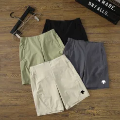 Hochwertige Descente-Shorts aus grünem Nylon der Urban Collection