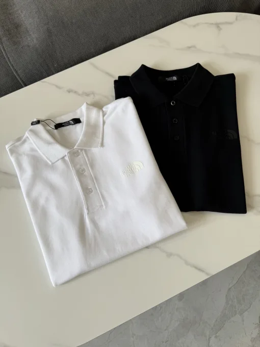 Bestseller The North Face Poloshirt Schwarz Baumwolle Klassischer Stil