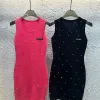 Luxus-Weste aus der Miu Miu-Kollektion mit rosa Stricklogo