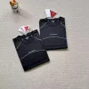 Premium Salomon Kurzarm Schwarz Casual Luxury