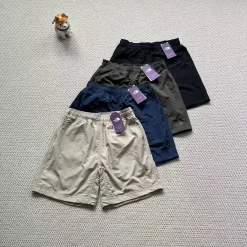 Premium The North Face Shorts Lila Nylon Bestickte Kollektion