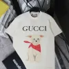 Bestseller der Gucci-Kollektion mit kurzem Ärmel und Beige-Print