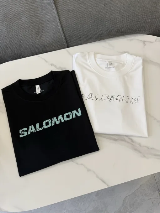 Bestseller Salomon Kurzarmshirt aus schwarzer Seide mit Logo, Luxus