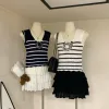 Luxus Chanel Weste Schwarz Strick Gestreift Stil