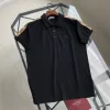 Hochwertige Burberry T-Shirts in Schwarz, bestickte Kollektion