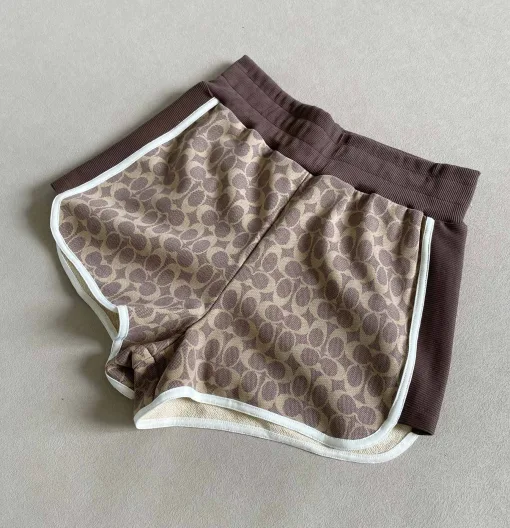 Luxus-Shorts von Coach in Braun aus der Graphic-Kollektion aus Baumwolle