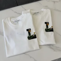 Premium Lacoste Kurzarm-Kollektion aus weißer, atmungsaktiver Baumwolle