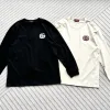 Hochwertiges Gucci Langarmshirt aus schwarzer Baumwolle im klassischen Stil