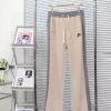 Hochwertige Nike Straight-Leg-Hose in schwarzem Baumwoll-Print-Stil
