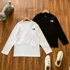 Hochwertige The North Face Langarmshirts aus weißer Baumwolle im klassischen Stil